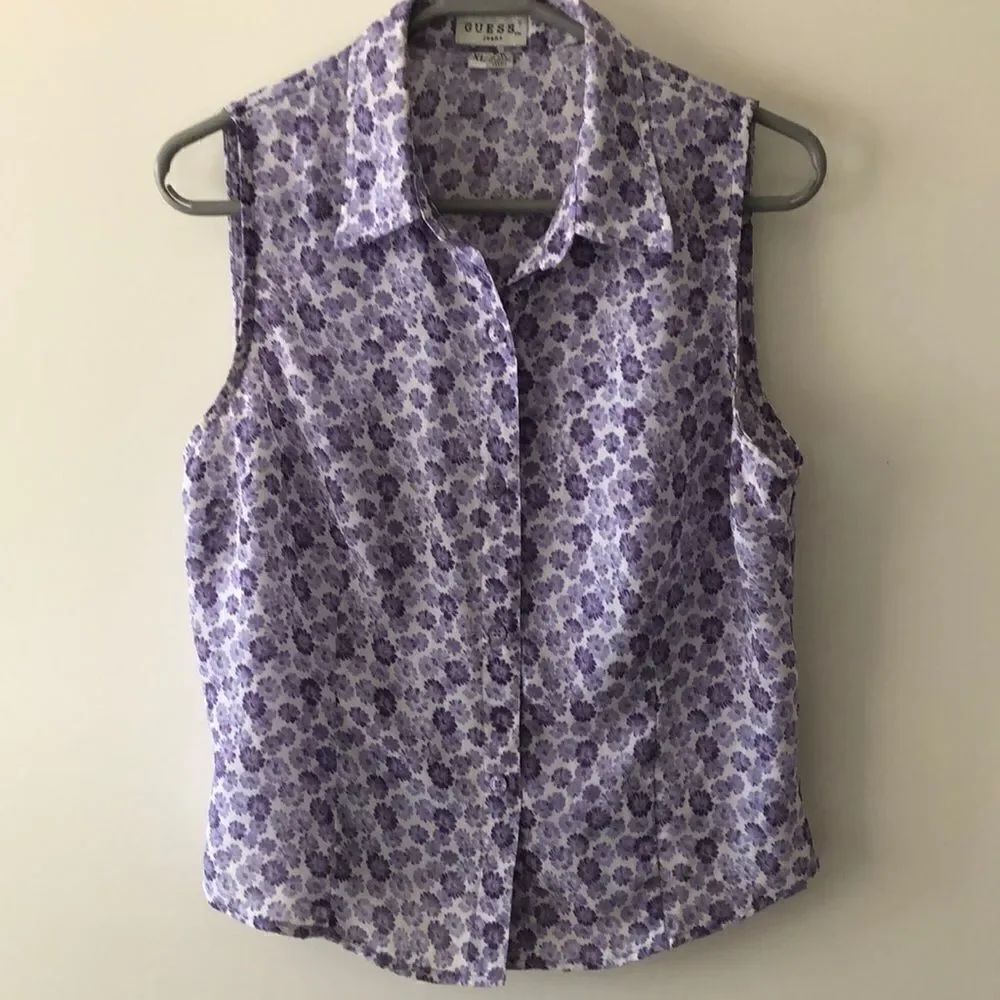 Guess Sleeveless blouse size XL gently Used